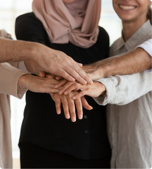 Team unity and empowerment with hands together showing collaboration and support