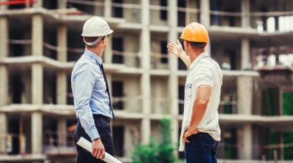 Construction professionals inspecting a building project as trusted contractors in Dubai