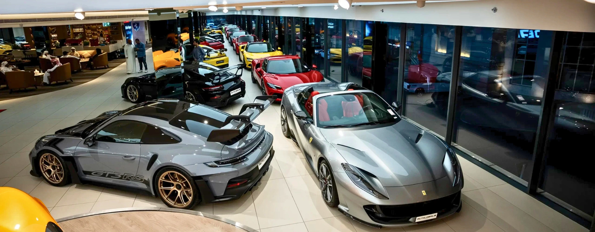 Luxury cars and supercars displayed at Auto Deals Dubai showroom
